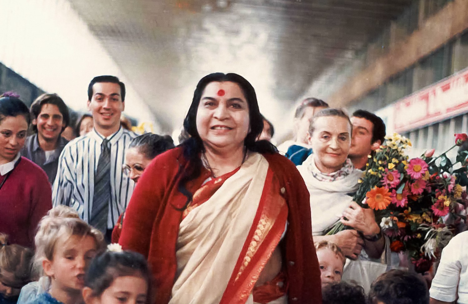 Shri Mataji being greeted at the Rome Train Station, May 1986