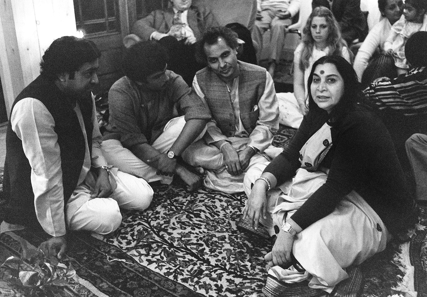 Shri Mataji with musicians in England